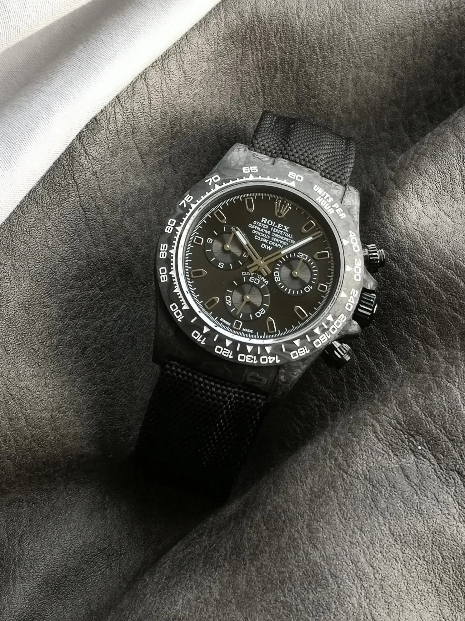 Rolex Daytona Carbon — photographed off the sweep