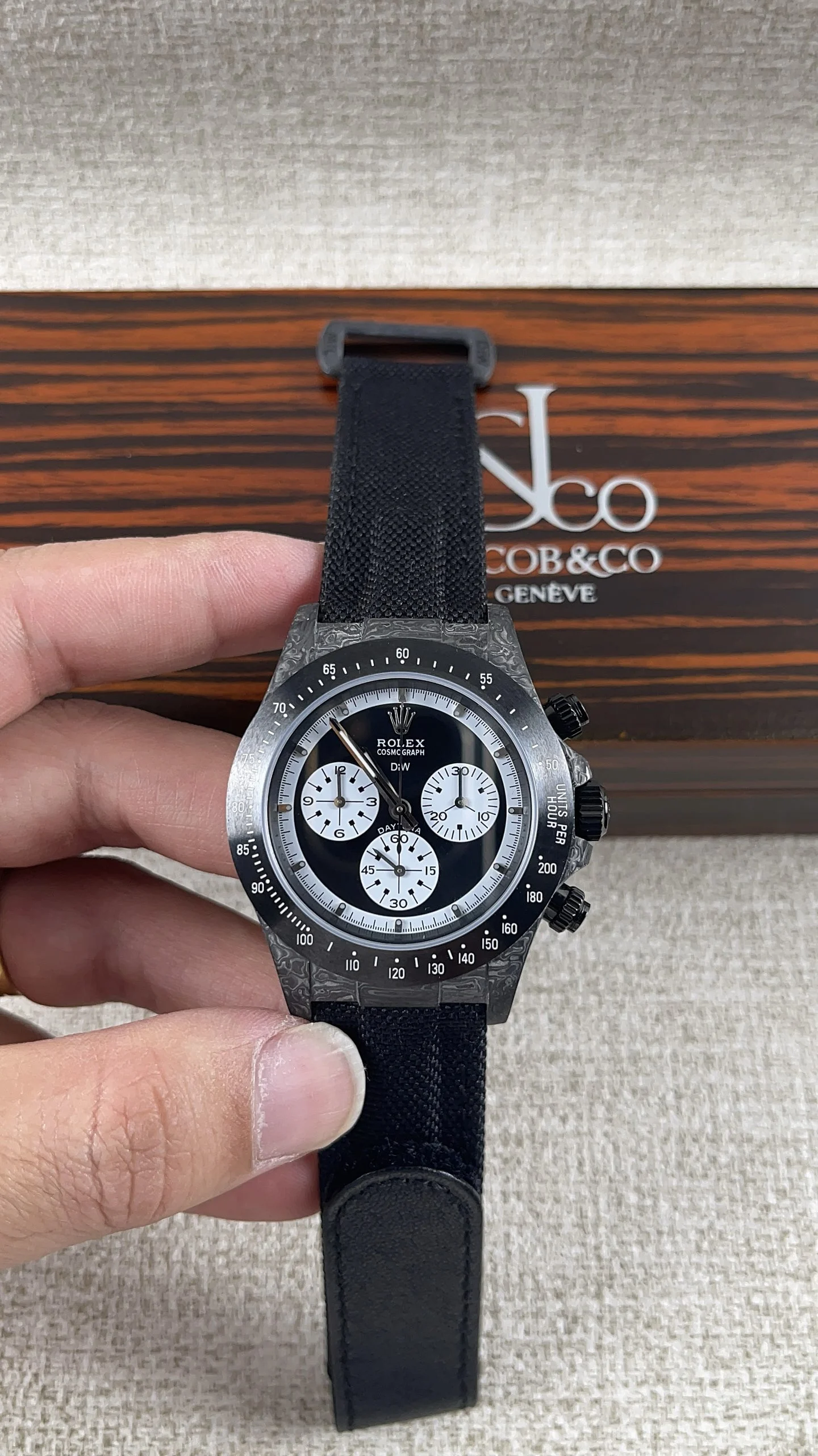 Rolex Daytona Carbon — photographed off the sweep