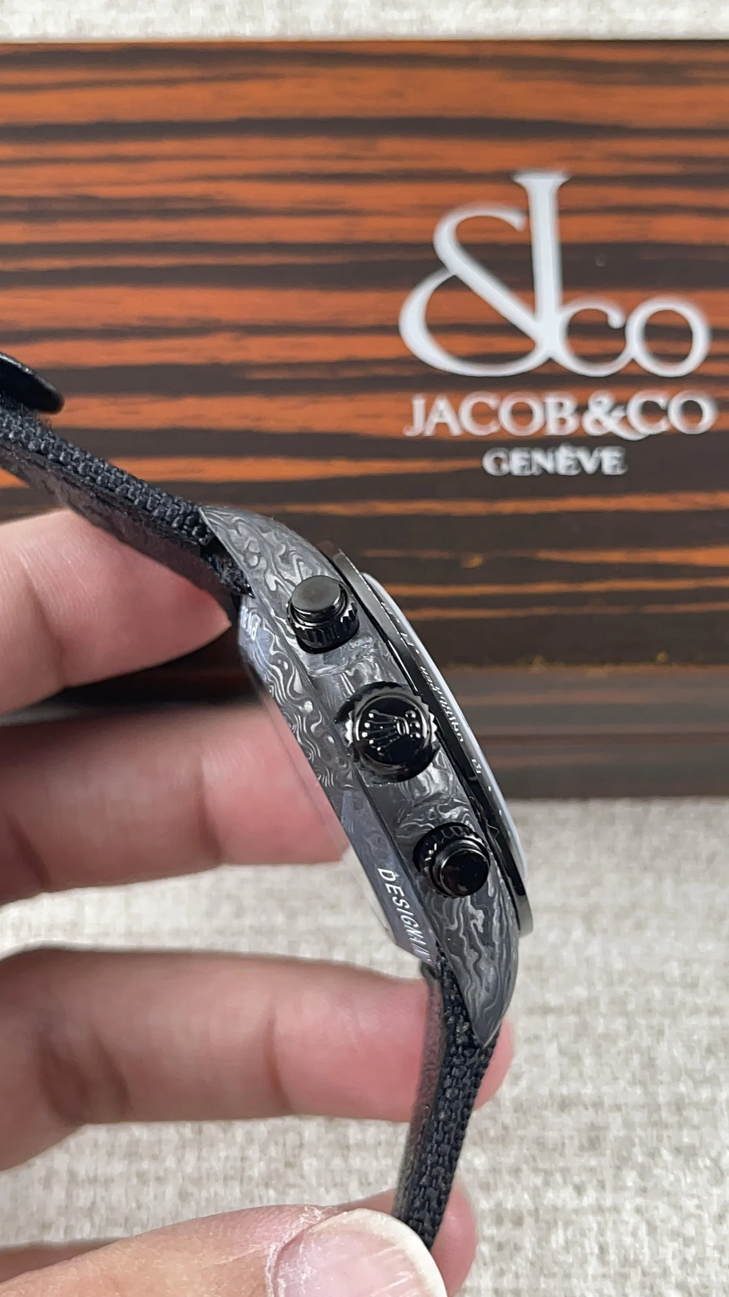 Rolex Daytona Carbon — photographed off the sweep
