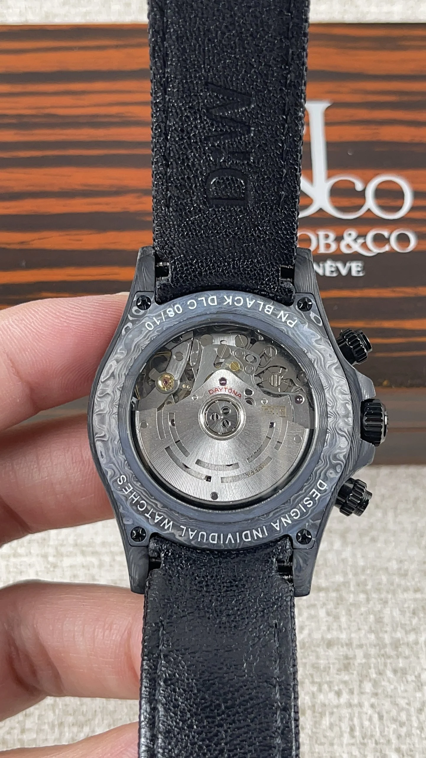 Rolex Daytona Carbon — photographed off the sweep