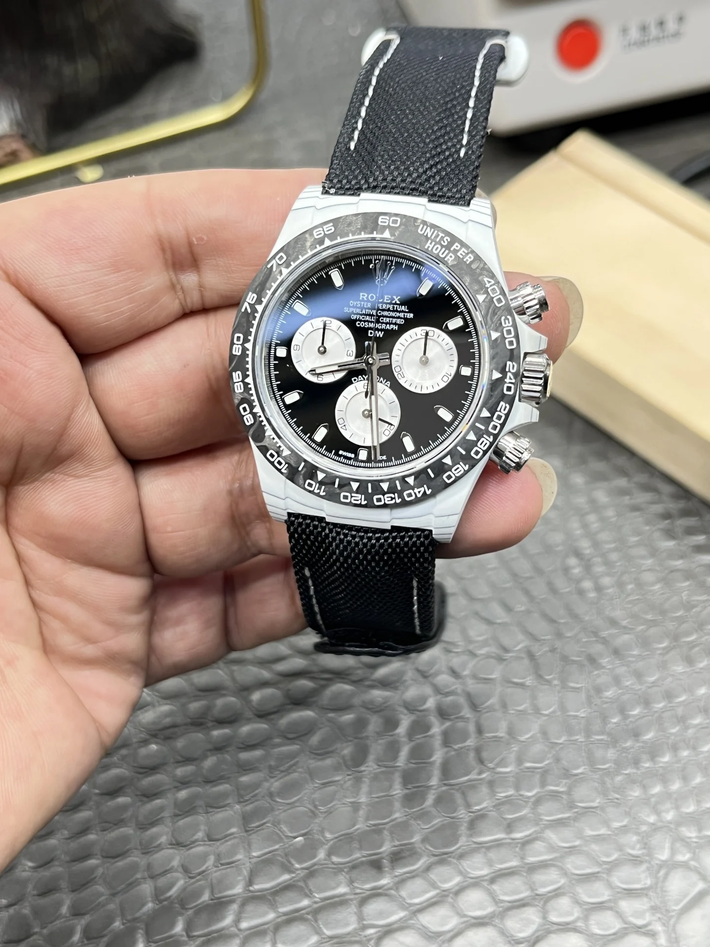 Rolex Daytona Panda Carbon — photographed off the sweep