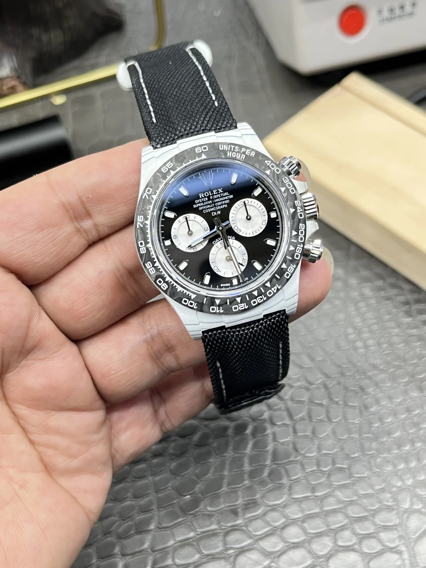 Rolex Daytona Panda Carbon — photographed off the sweep