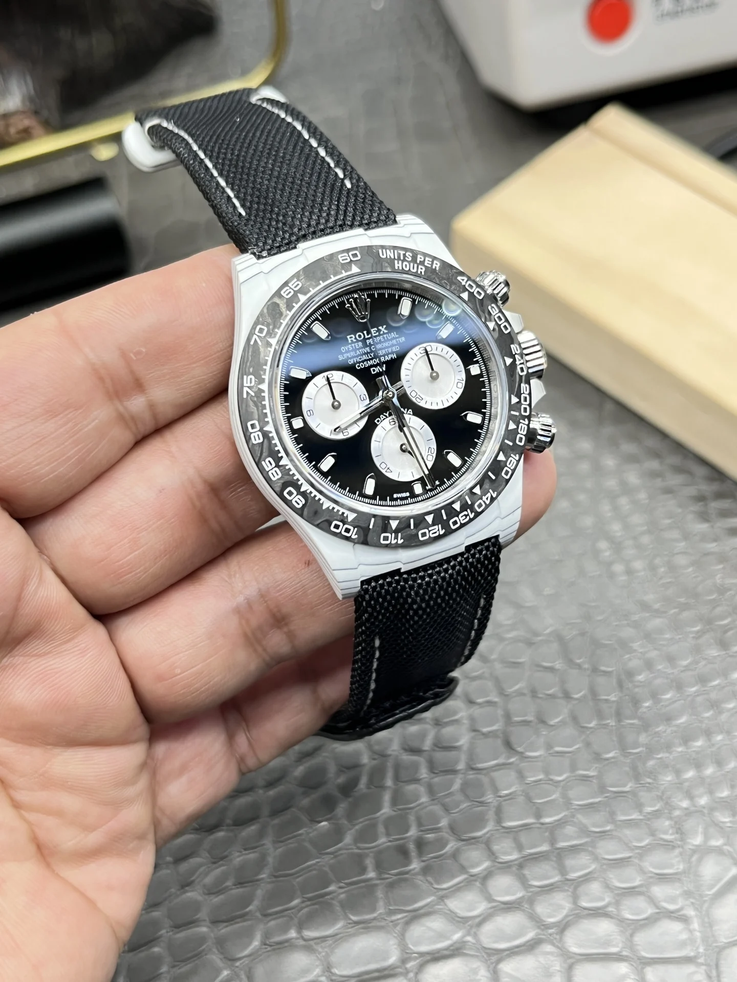 Rolex Daytona Panda Carbon — photographed off the sweep