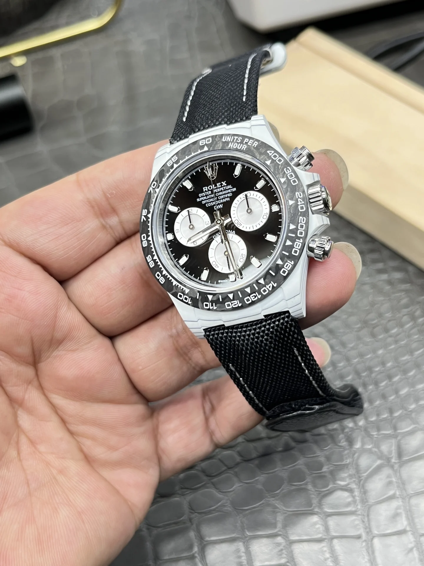 Rolex Daytona Panda Carbon — photographed off the sweep