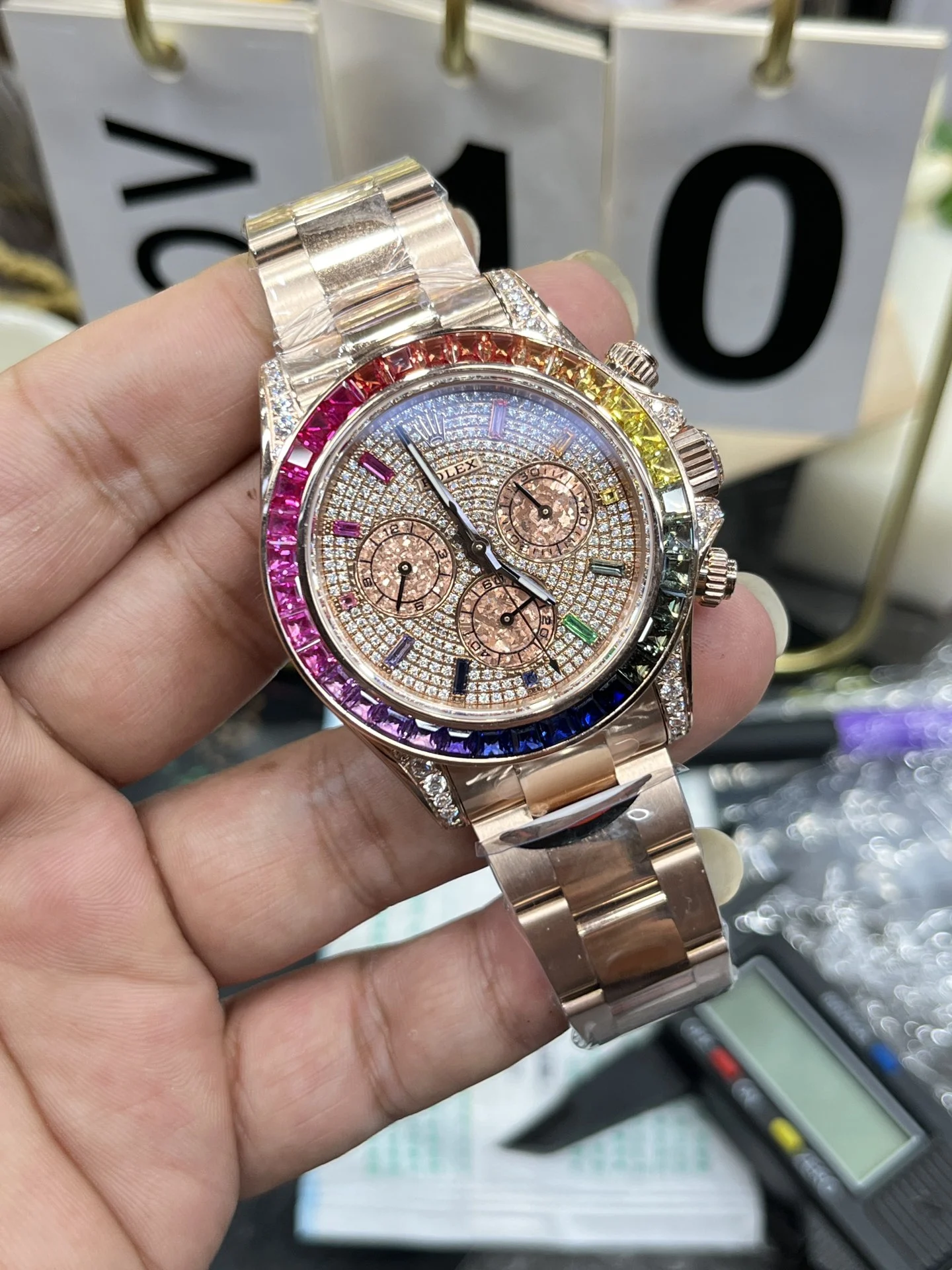 Rolex Daytona Rainbow Diamond-Set 40mm — photographed off the sweep