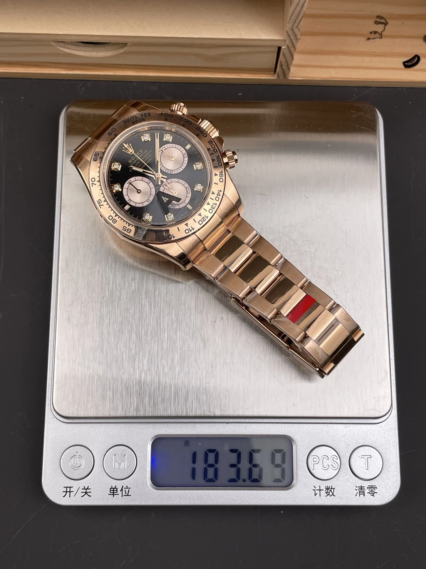 Rolex Daytona Rose Gold Black Dial Diamond-Set 40mm — photographed off the sweep
