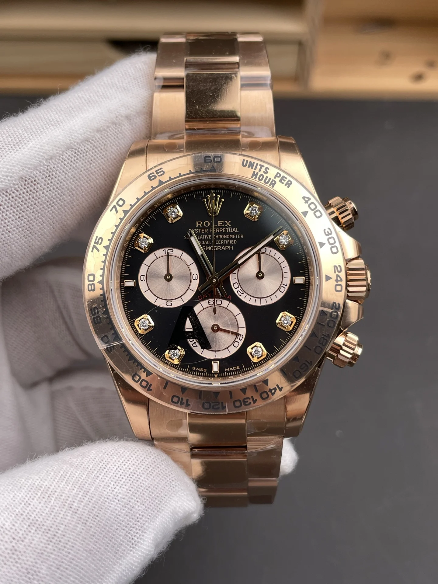 Rolex Daytona Rose Gold Black Dial Diamond-Set 40mm — photographed off the sweep