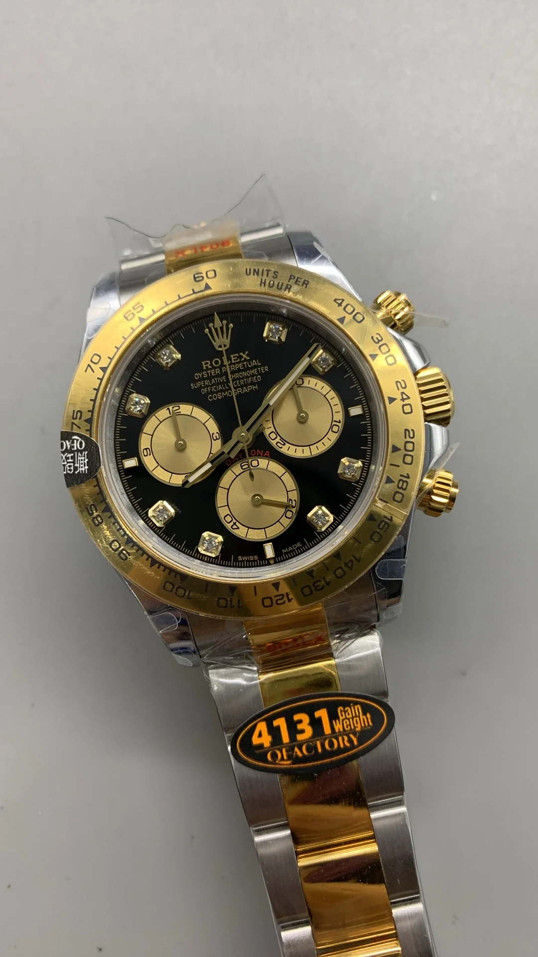 Rolex Daytona Two-Tone Black Dial Diamond-Set — photographed off the sweep