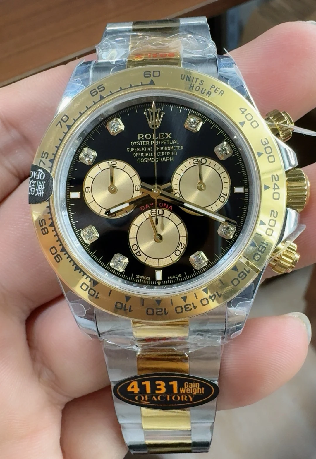 Rolex Daytona Two-Tone Black Dial Diamond-Set — photographed off the sweep