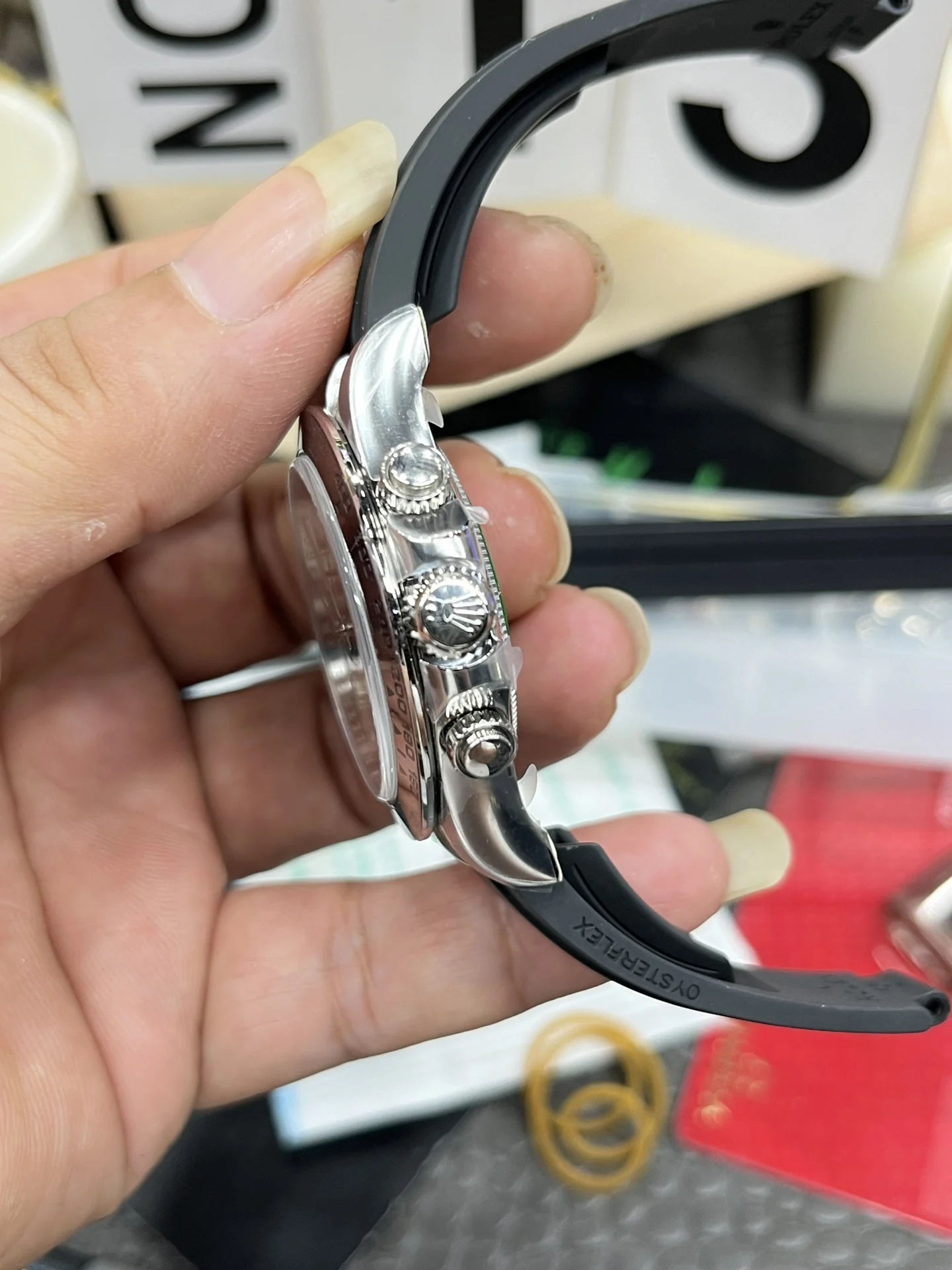 Rolex Daytona White Dial 40mm — photographed off the sweep