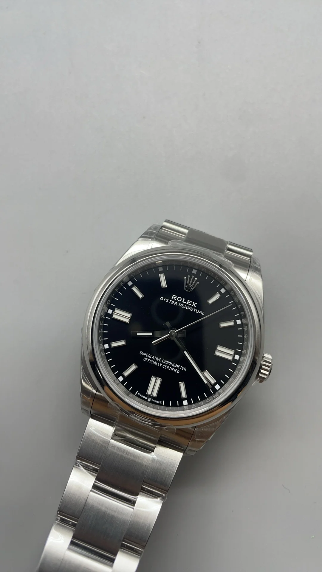 Rolex Oyster Perpetual Black Dial 36mm — photographed off the sweep