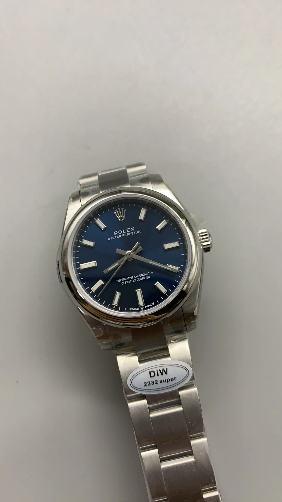 Rolex Oyster Perpetual Blue Dial 31mm — photographed off the sweep