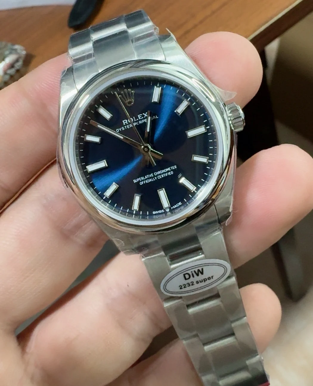 Rolex Oyster Perpetual Blue Dial 31mm — photographed off the sweep