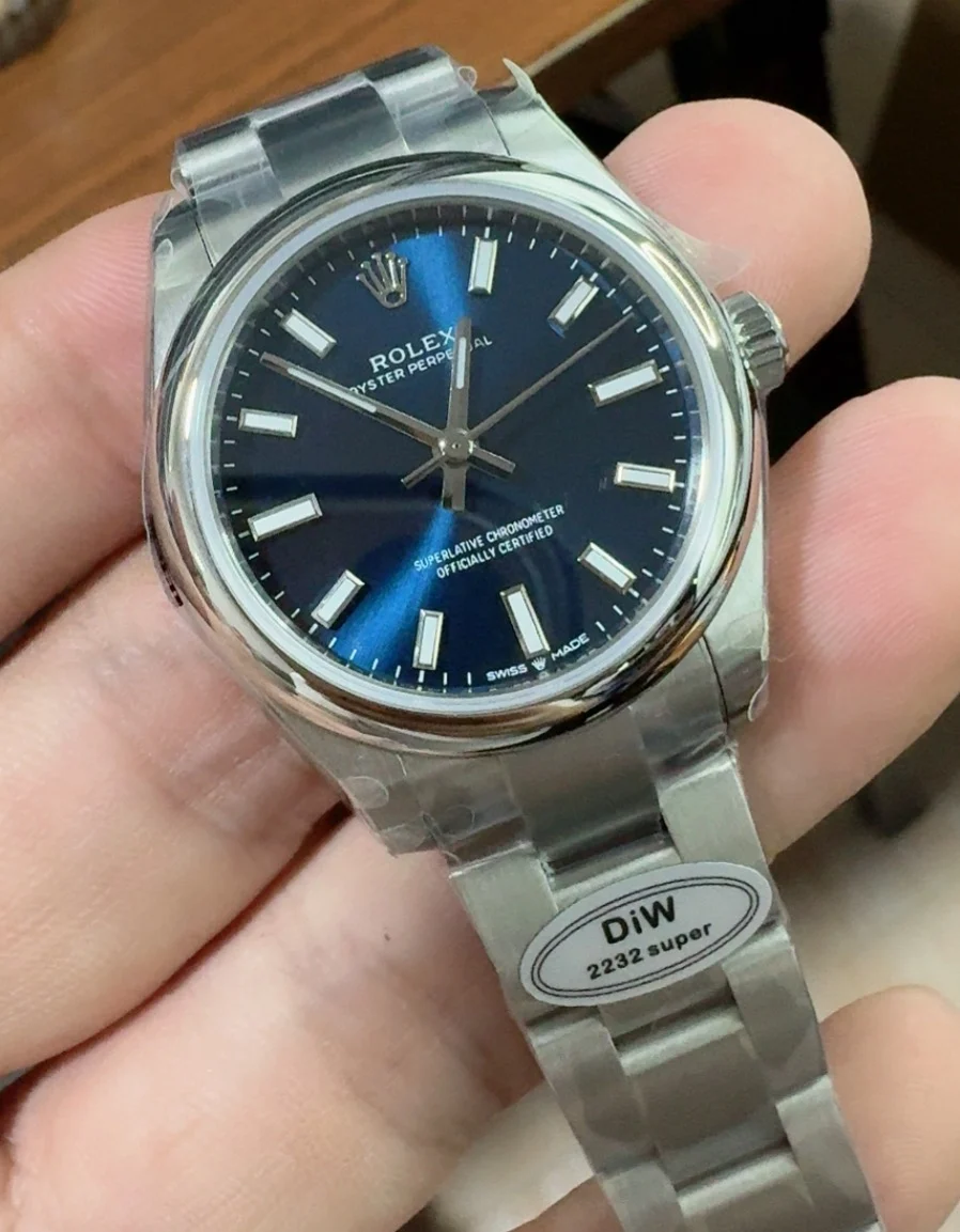 Rolex Oyster Perpetual Blue Dial 31mm — photographed off the sweep