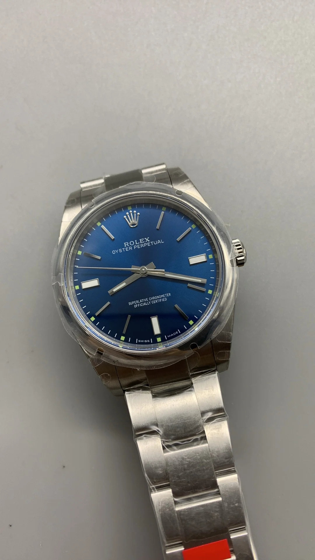 Rolex Oyster Perpetual Blue Dial 39mm — photographed off the sweep