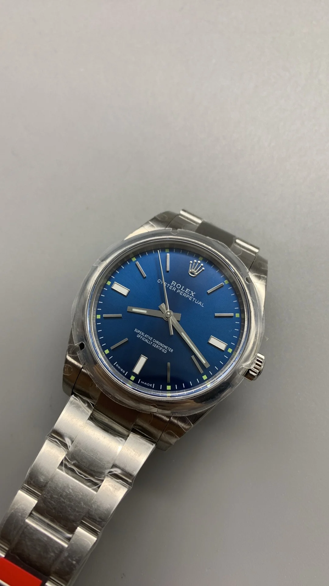 Rolex Oyster Perpetual Blue Dial 39mm — photographed off the sweep