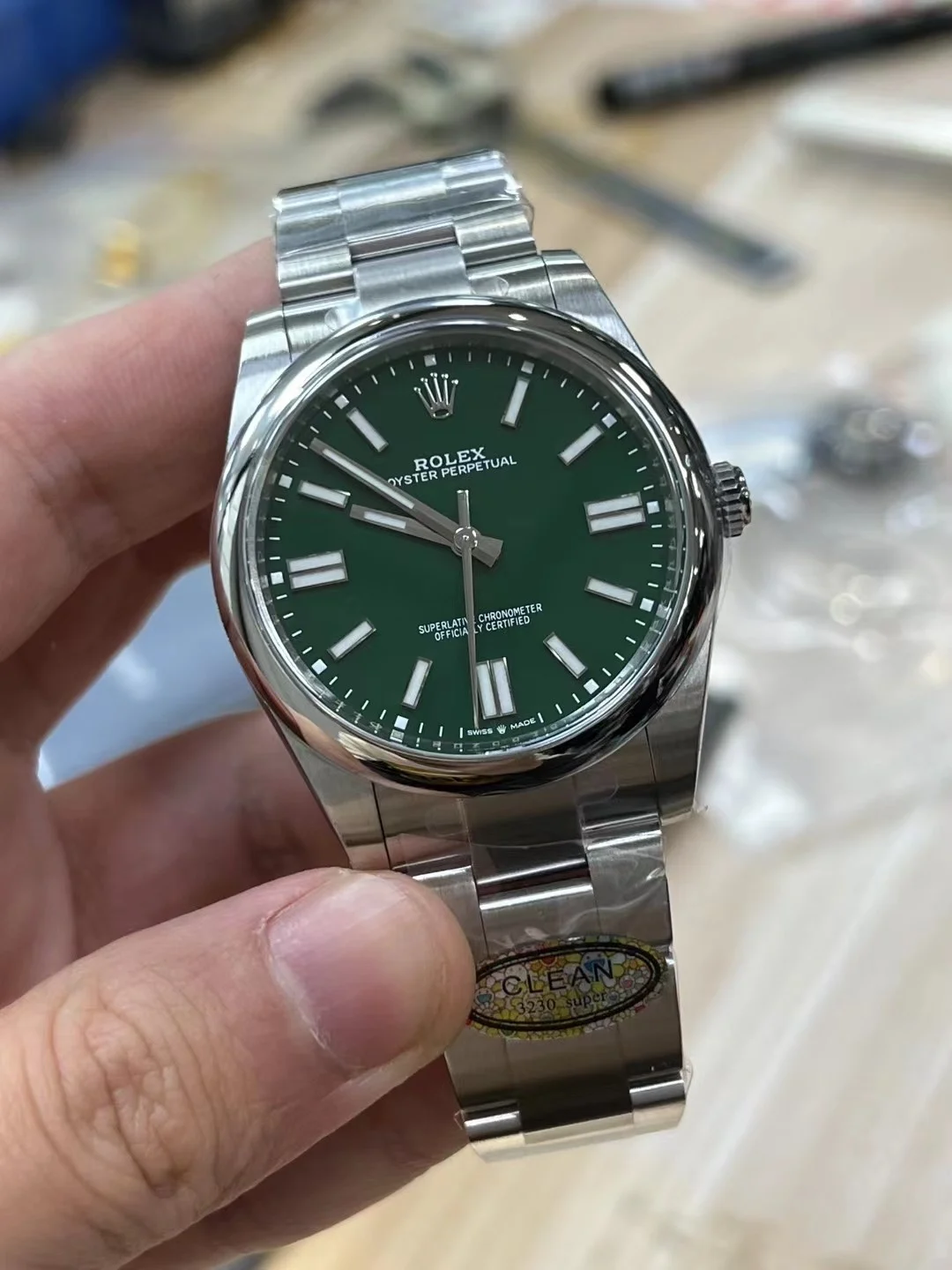 Rolex Oyster Perpetual Green Dial — photographed off the sweep