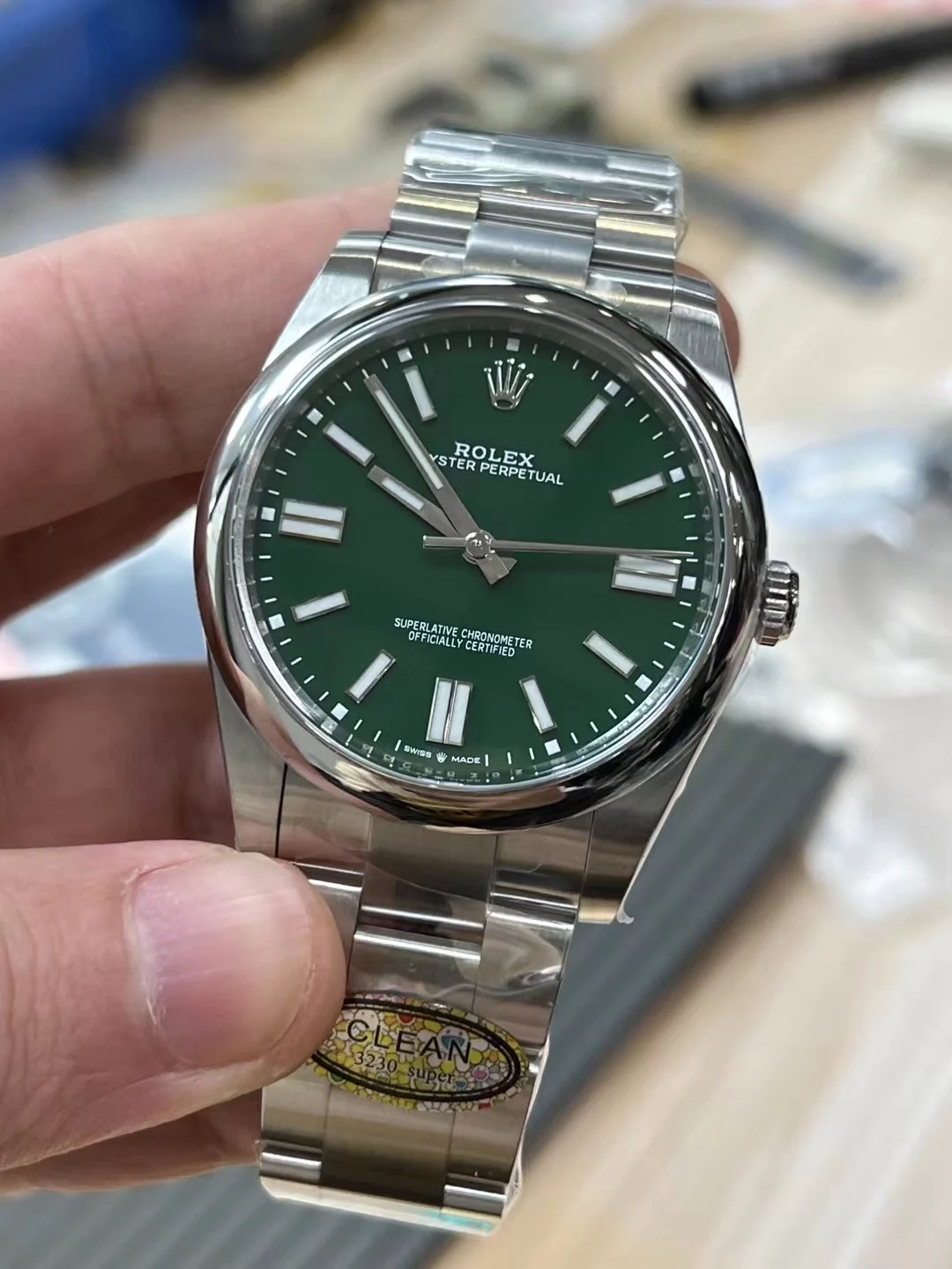 Rolex Oyster Perpetual Green Dial — photographed off the sweep