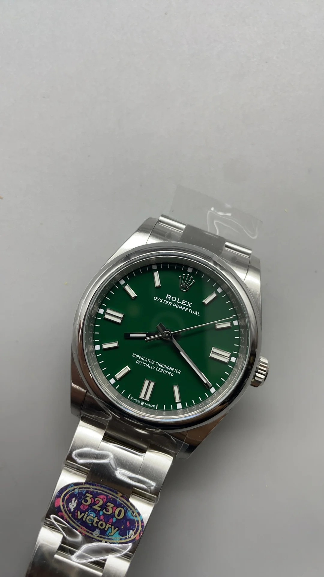 Rolex Oyster Perpetual Green Dial — photographed off the sweep