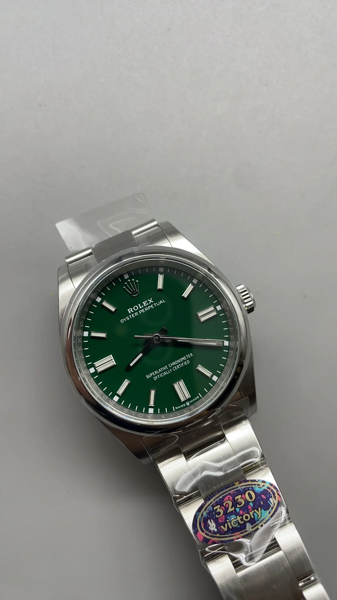 Rolex Oyster Perpetual Green Dial — photographed off the sweep