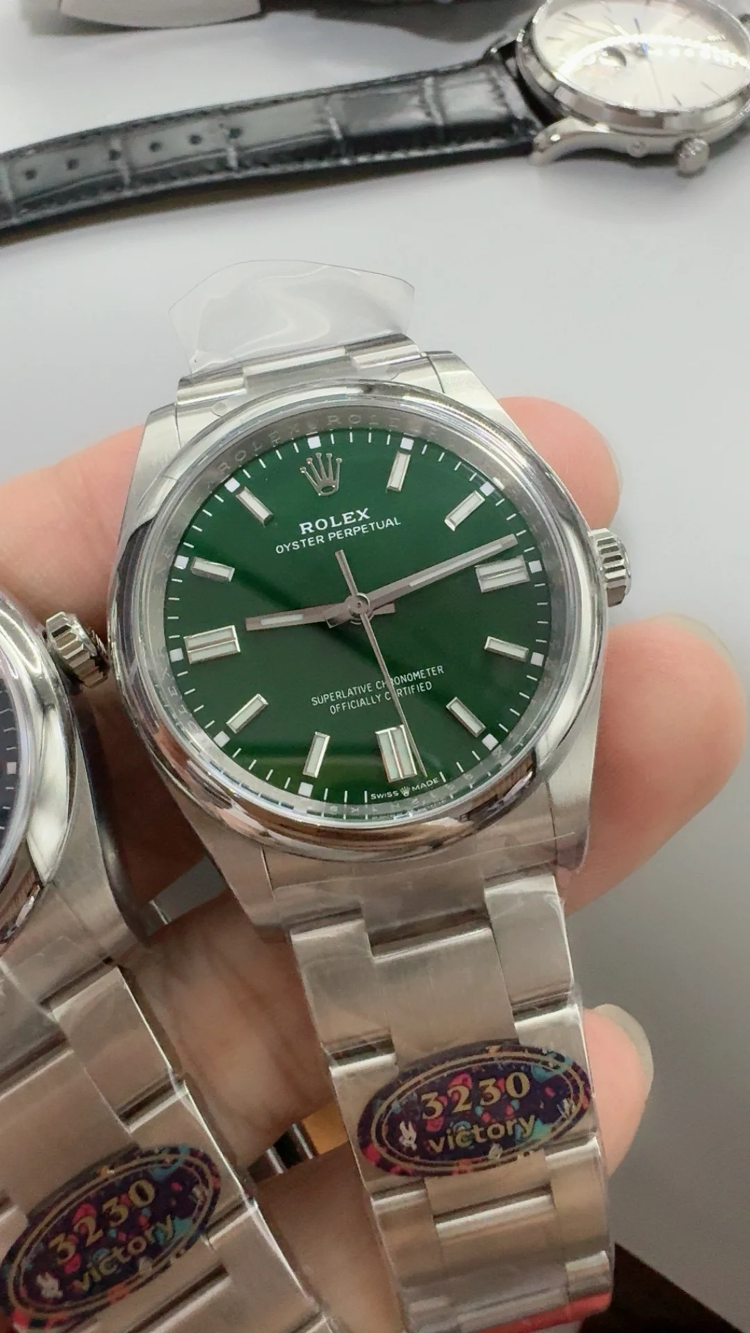 Rolex Oyster Perpetual Green Dial — photographed off the sweep