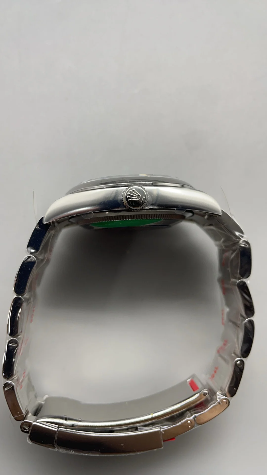 Rolex Oyster Perpetual Green Dial — photographed off the sweep