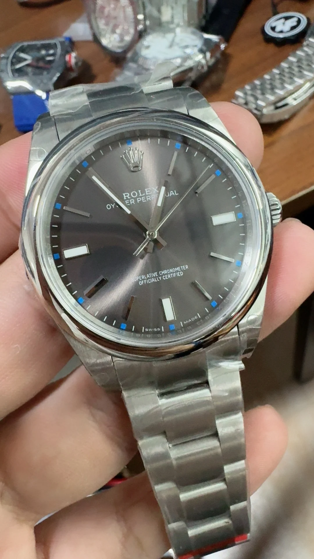 Rolex Oyster Perpetual Grey Dial 39mm — photographed off the sweep