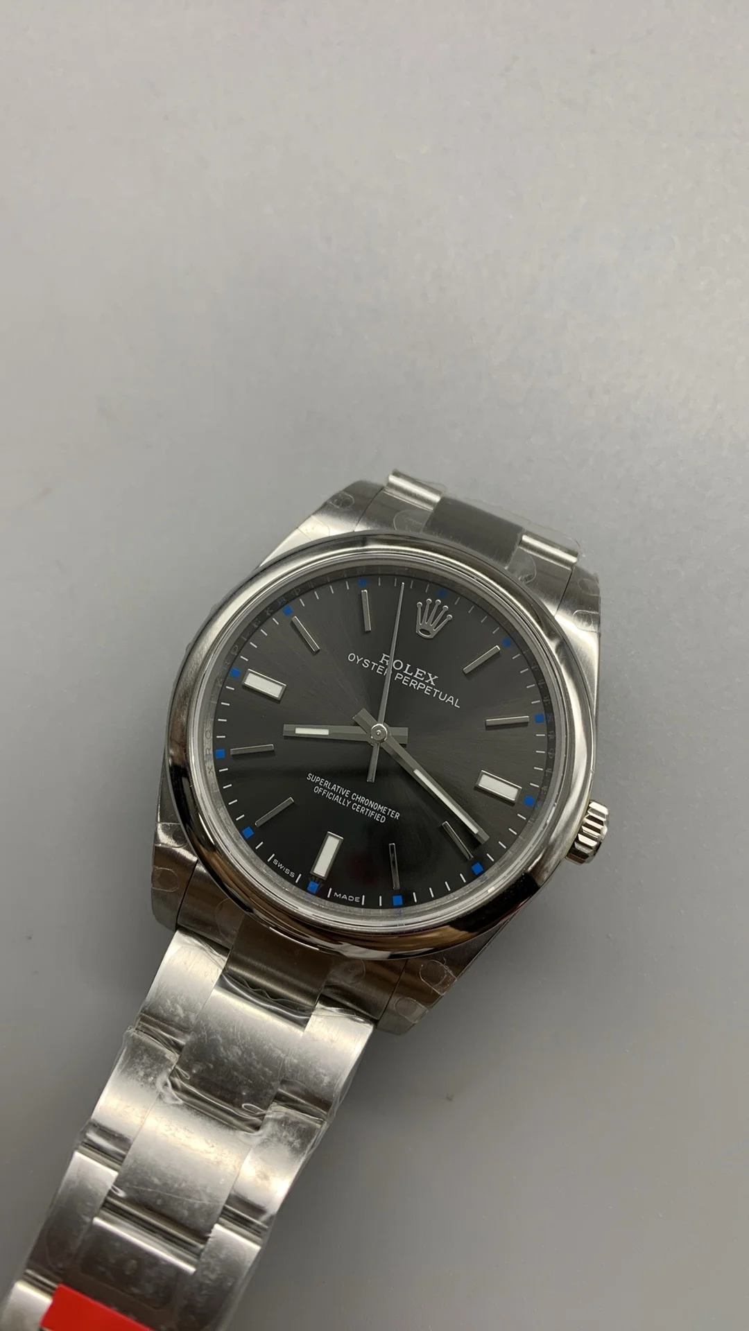 Rolex Oyster Perpetual Grey Dial 39mm — photographed off the sweep