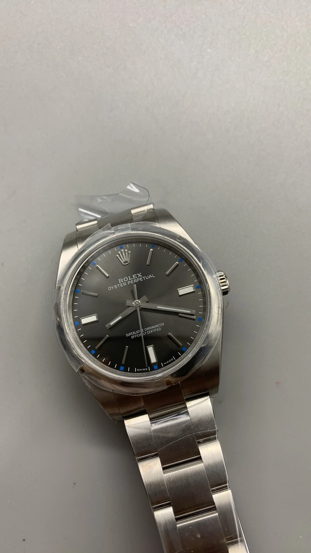 Rolex Oyster Perpetual Grey Dial 39mm — photographed off the sweep
