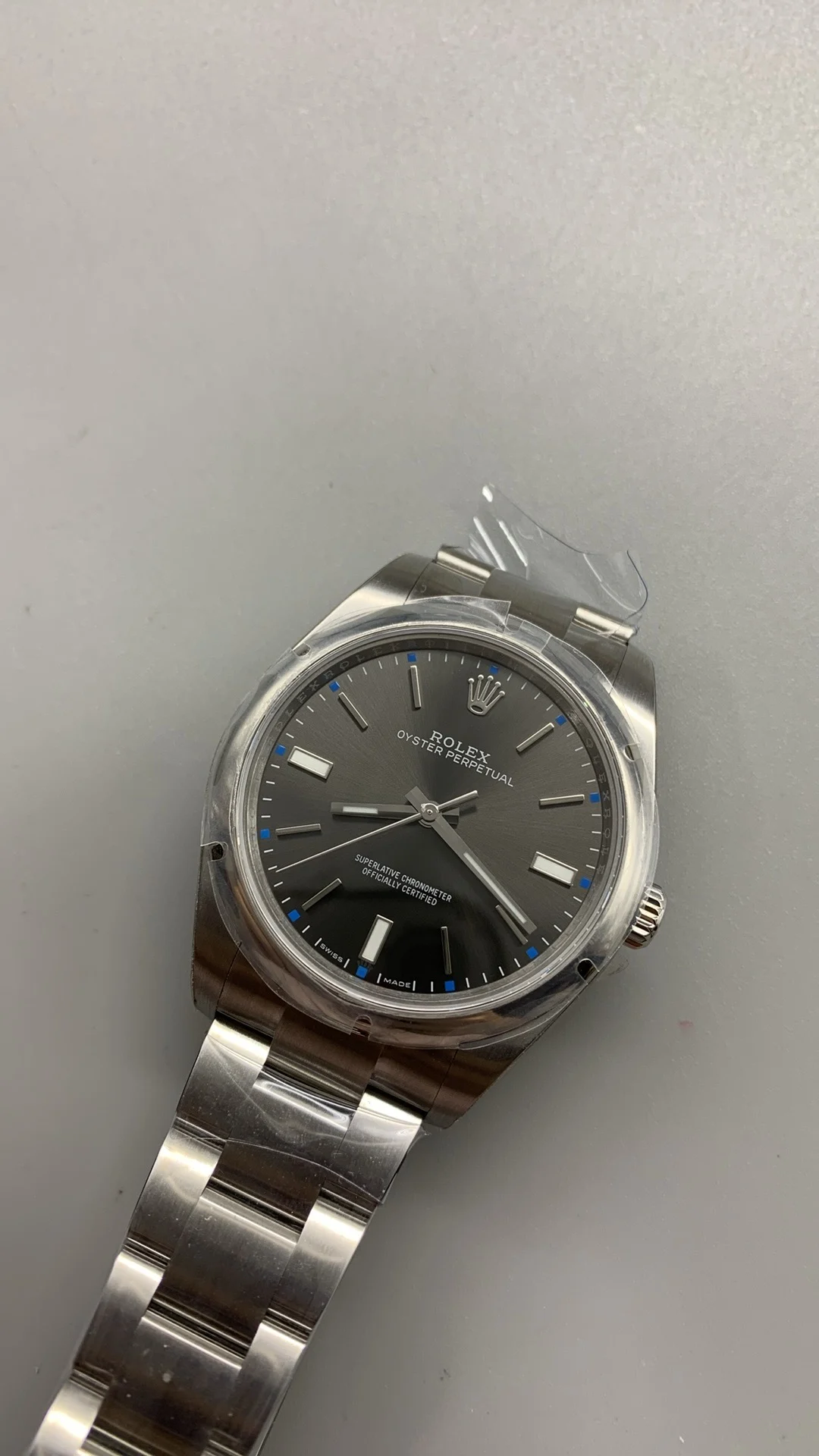 Rolex Oyster Perpetual Grey Dial 39mm — photographed off the sweep