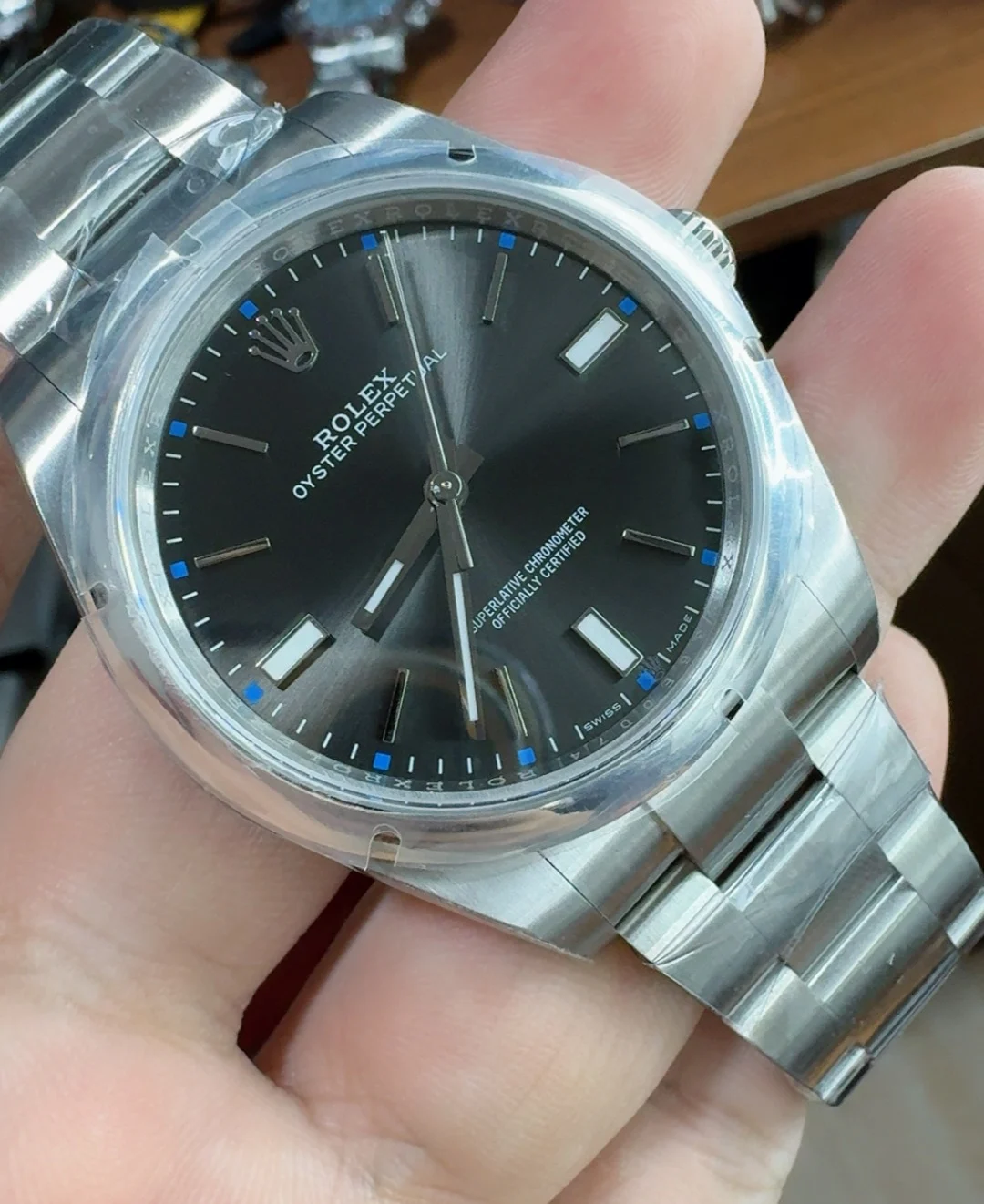 Rolex Oyster Perpetual Grey Dial 39mm — photographed off the sweep