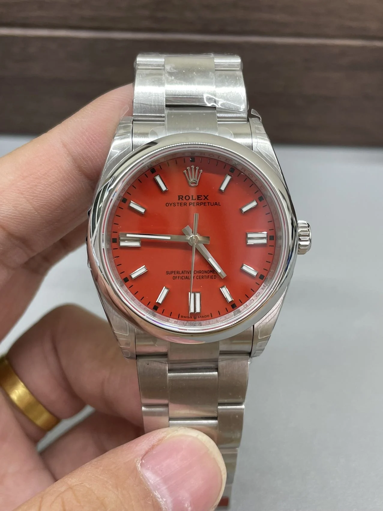 Rolex Oyster Perpetual Red Dial 36mm — photographed off the sweep