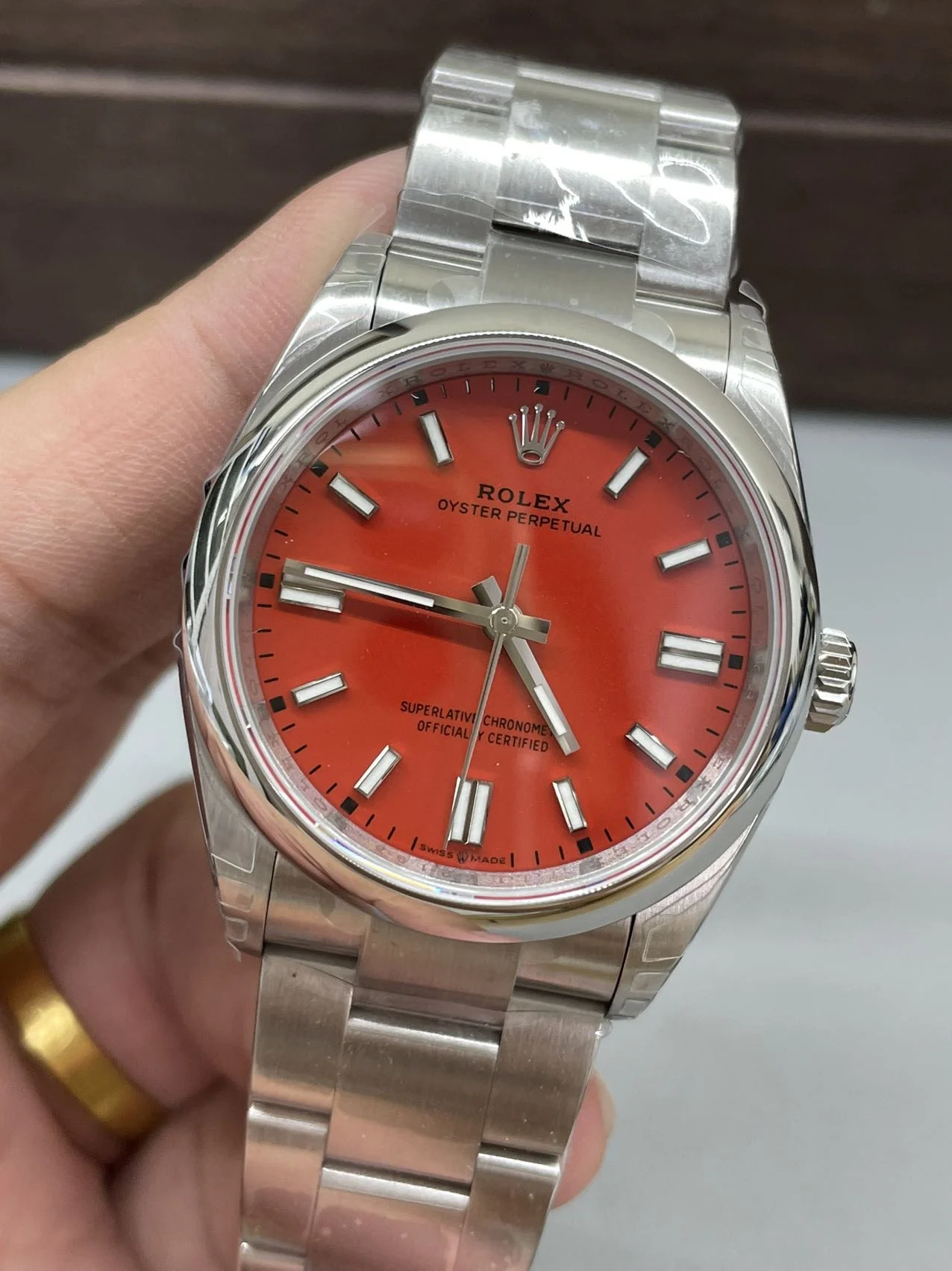 Rolex Oyster Perpetual Red Dial 36mm — photographed off the sweep