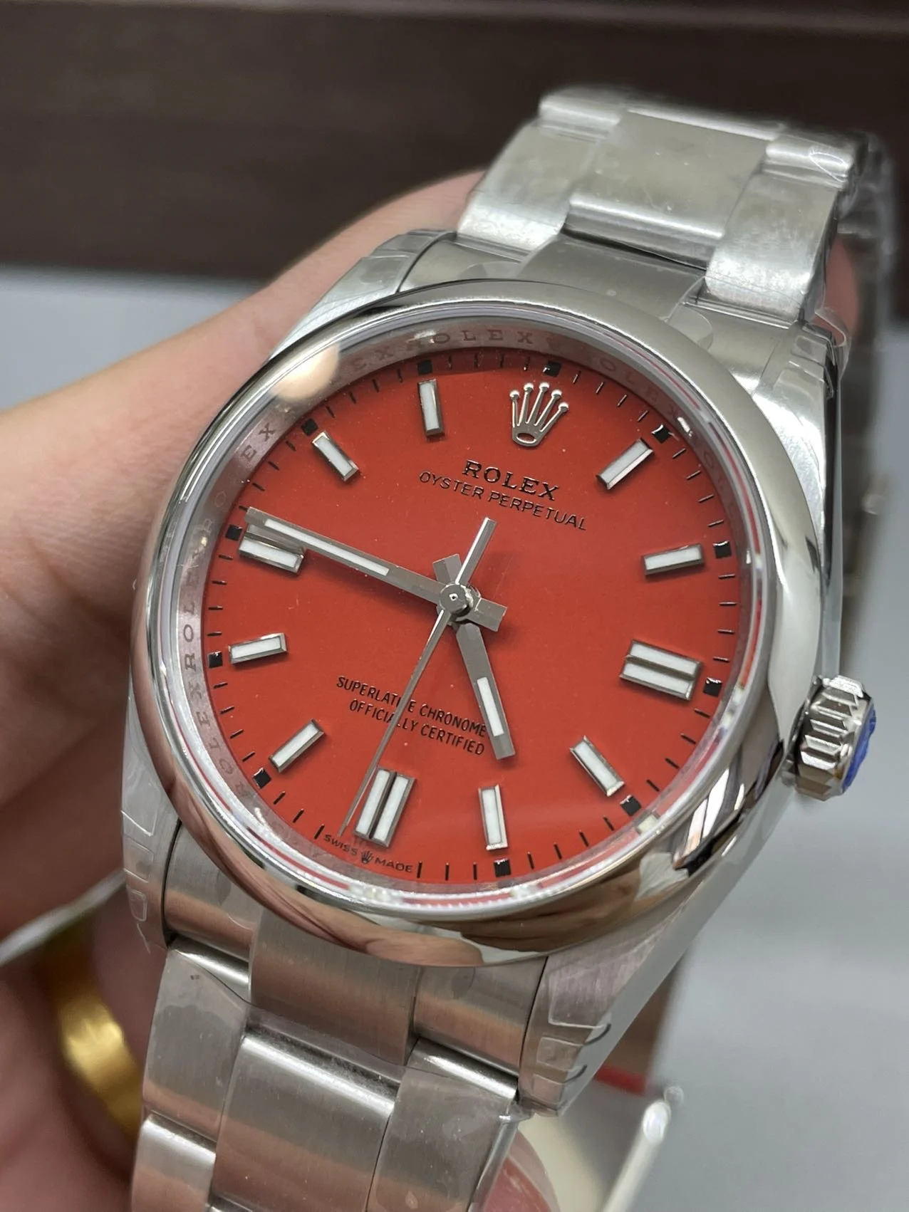 Rolex Oyster Perpetual Red Dial 36mm — photographed off the sweep