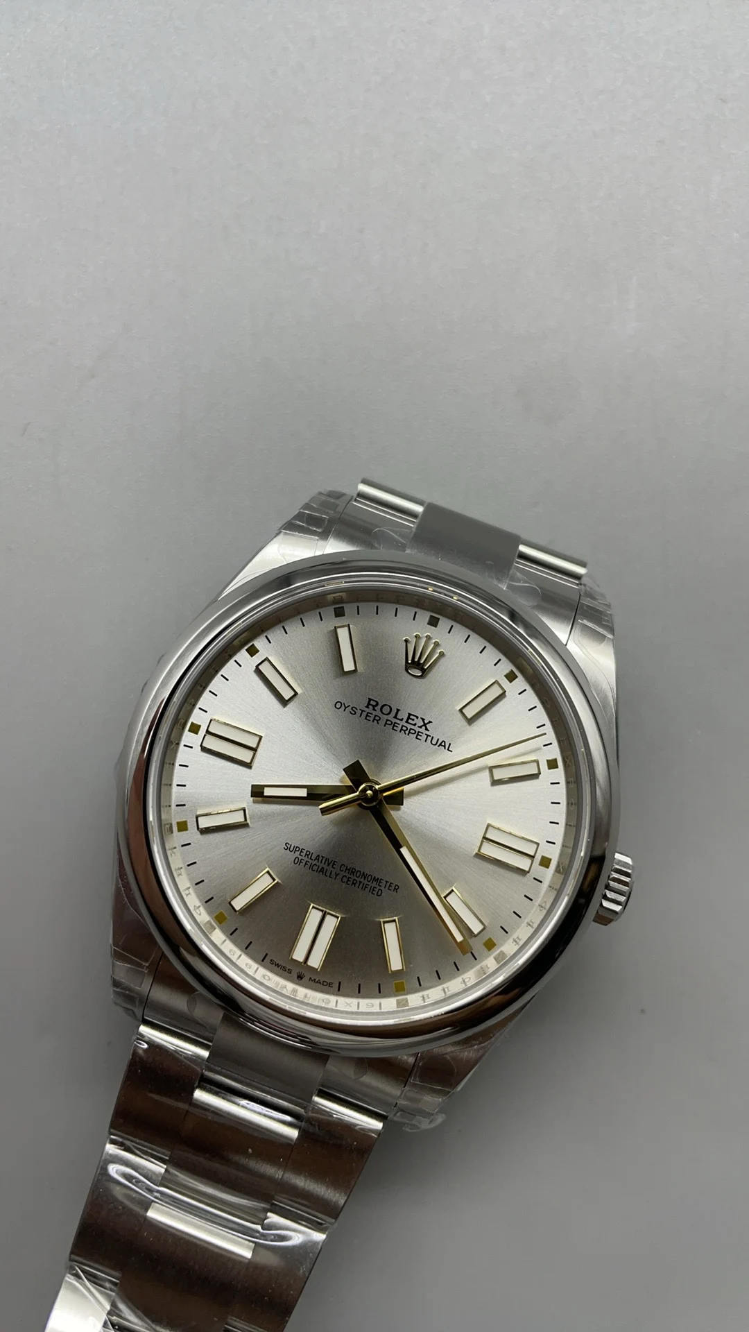 Rolex Oyster Perpetual Silver Dial — photographed off the sweep