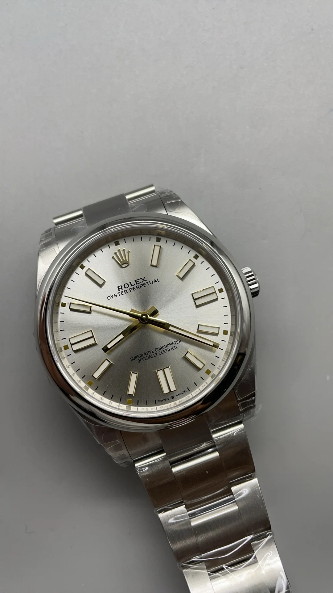 Rolex Oyster Perpetual Silver Dial — photographed off the sweep