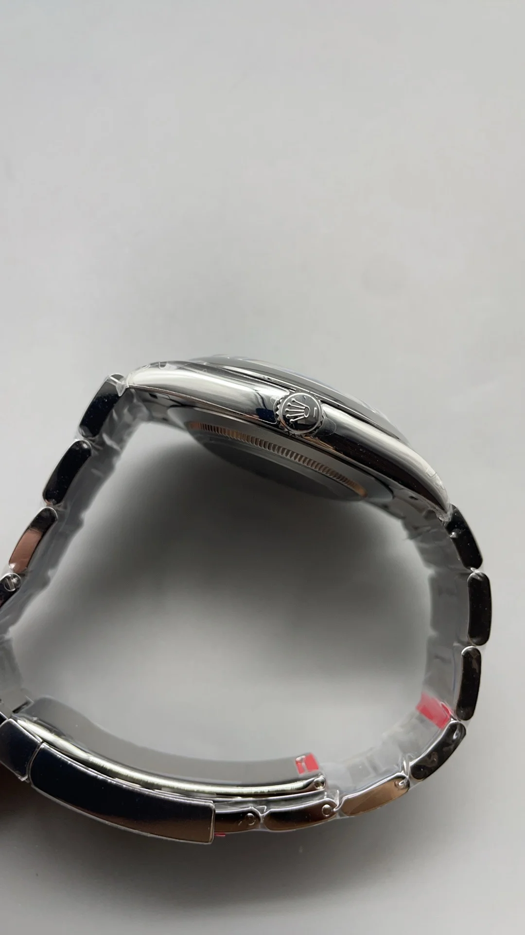 Rolex Oyster Perpetual Silver Dial — photographed off the sweep