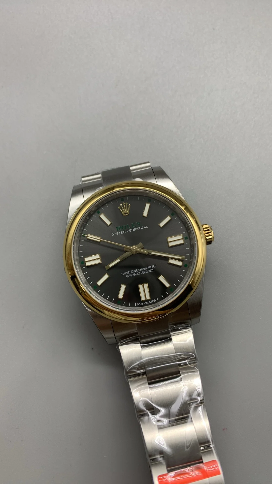 Rolex Oyster Perpetual Two-Tone Grey Dial 41mm — photographed off the sweep