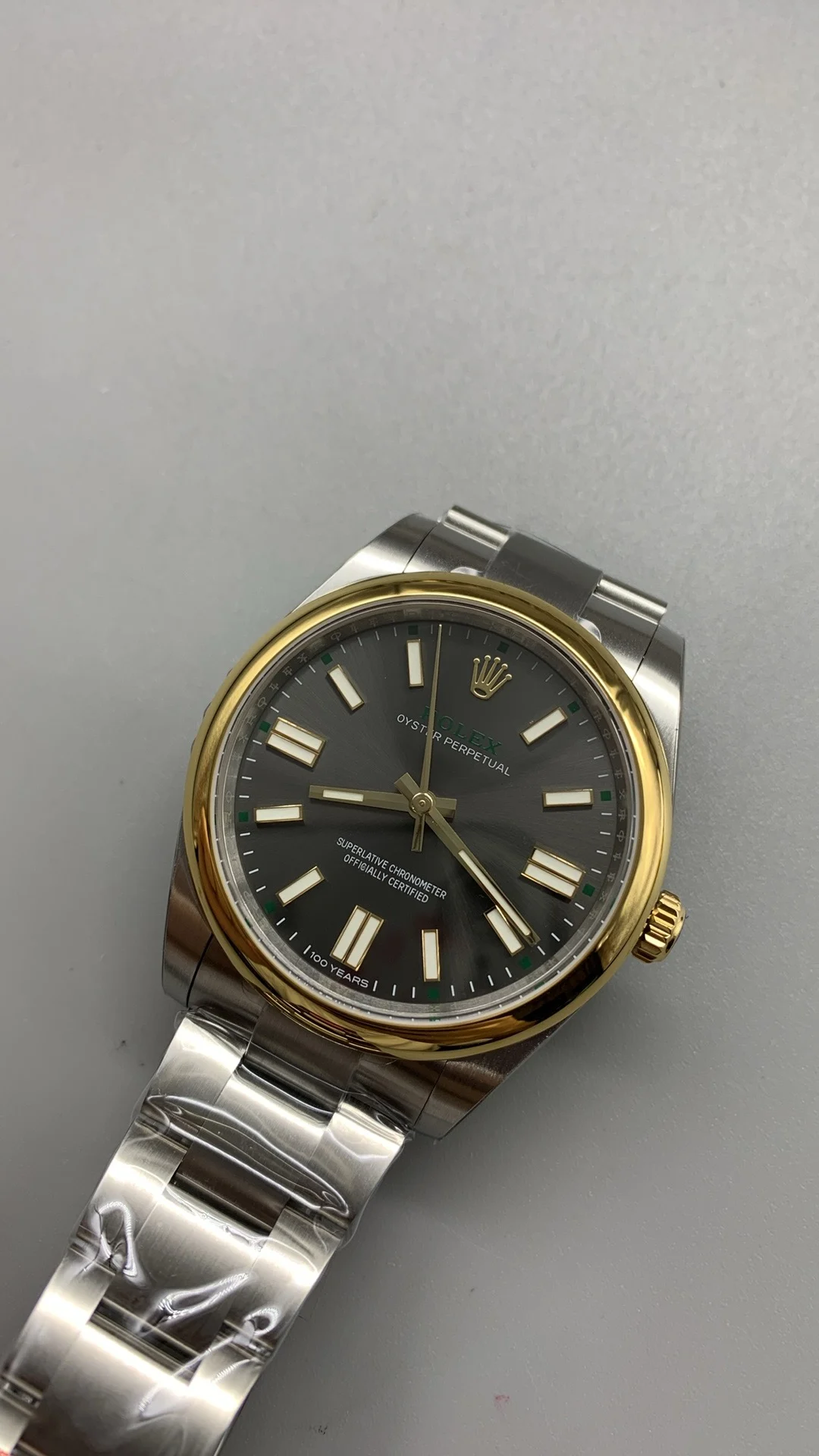 Rolex Oyster Perpetual Two-Tone Grey Dial 41mm — photographed off the sweep