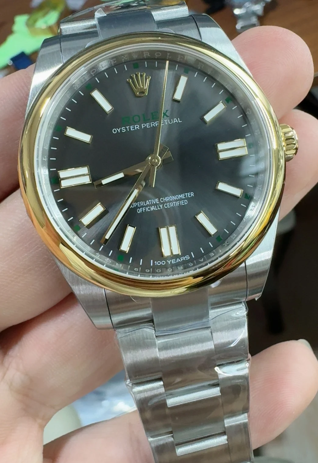 Rolex Oyster Perpetual Two-Tone Grey Dial 41mm — photographed off the sweep