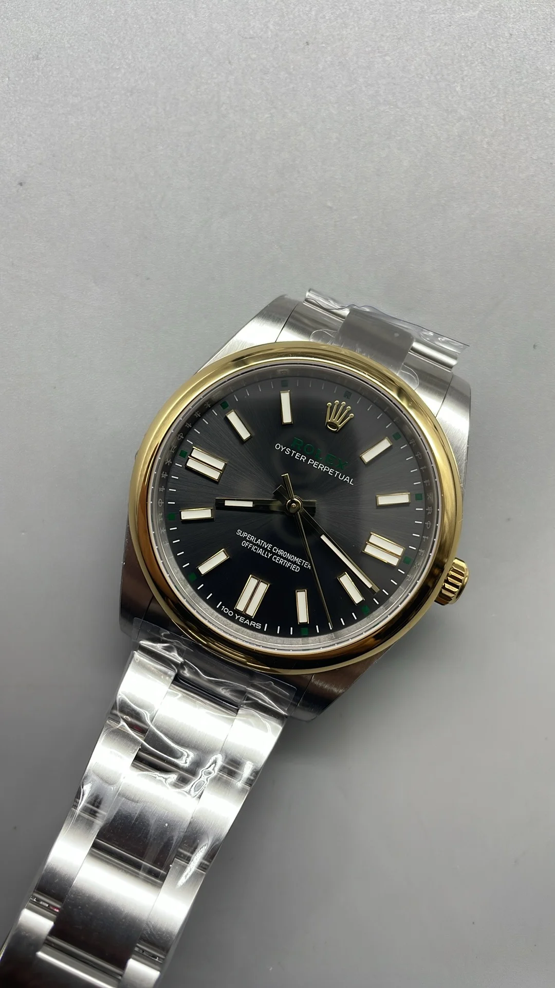 Rolex Oyster Perpetual Two-Tone Grey Dial 41mm — photographed off the sweep