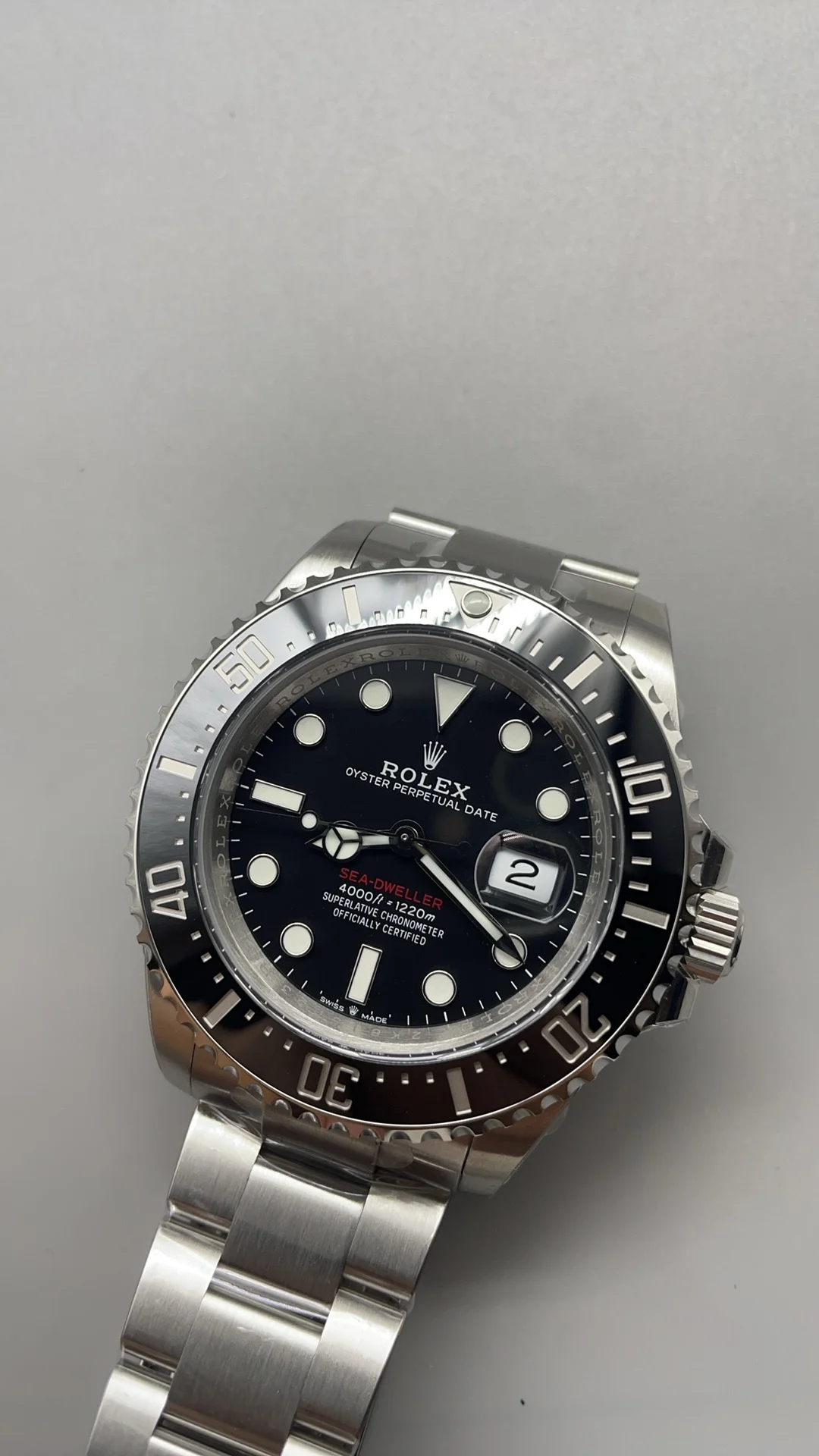 Rolex Red Dial — photographed off the sweep