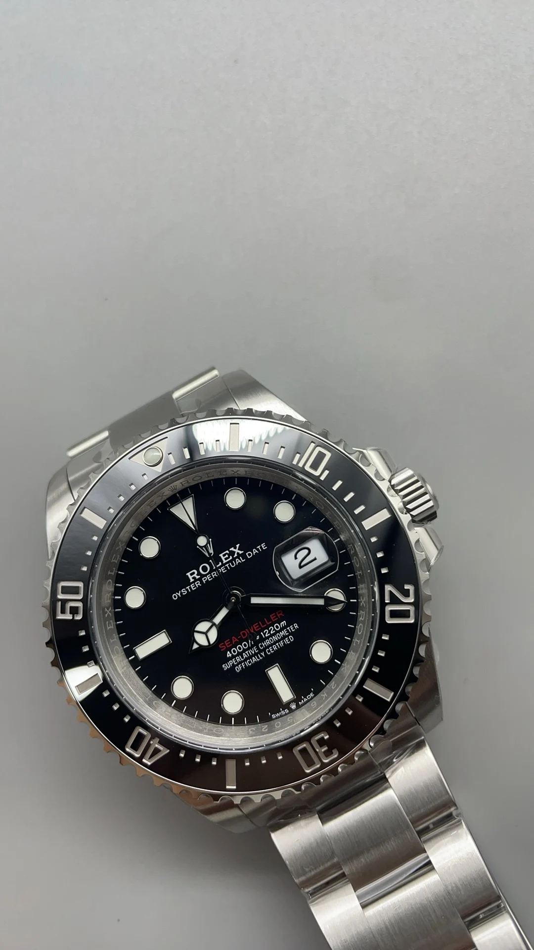 Rolex Red Dial — photographed off the sweep