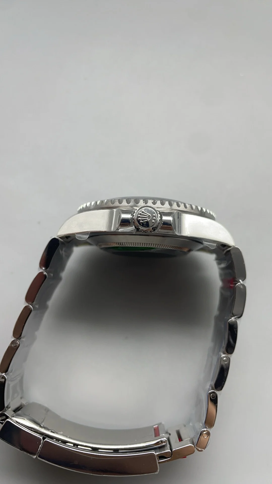Rolex Red Dial — photographed off the sweep