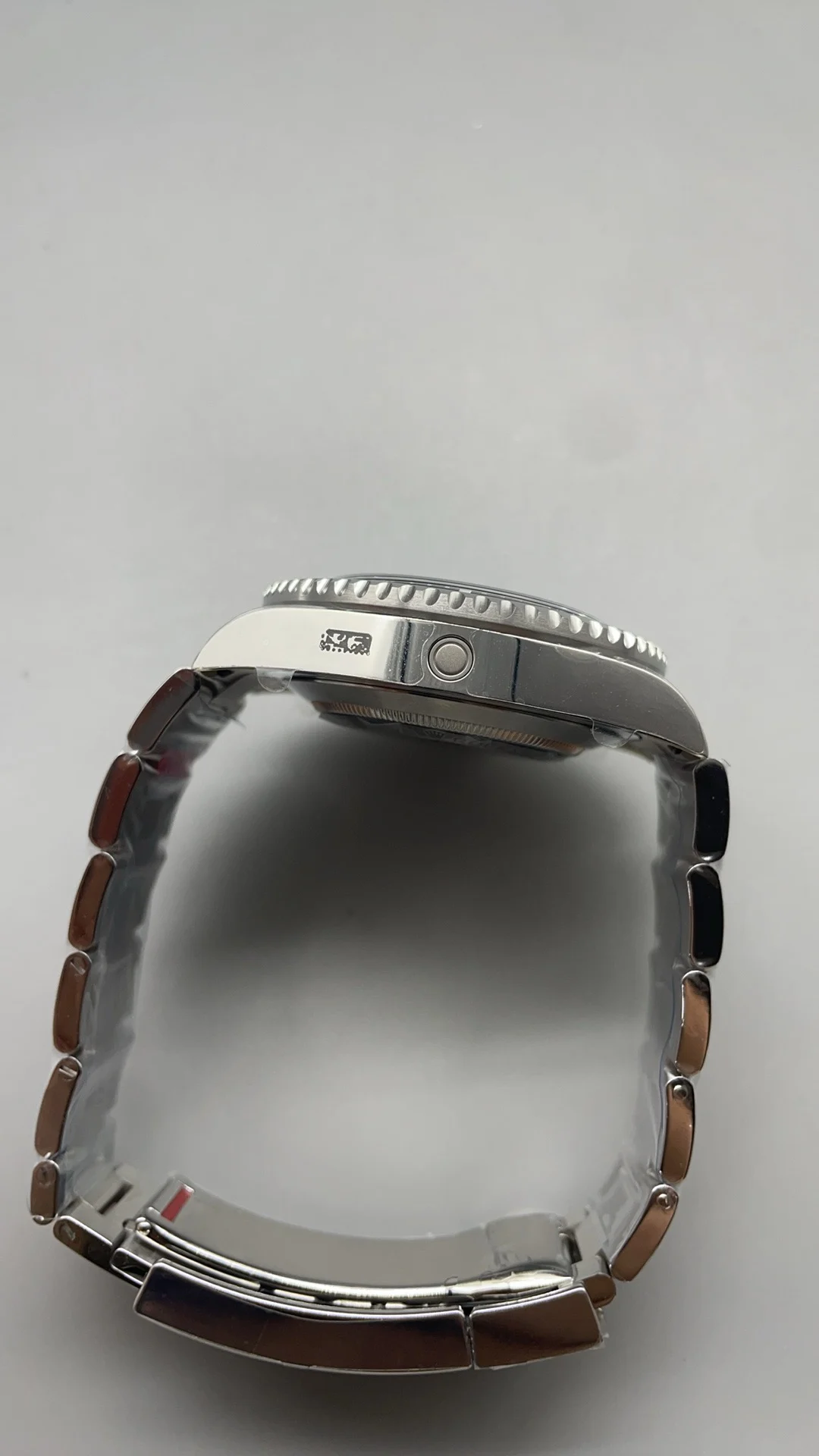 Rolex Red Dial — photographed off the sweep