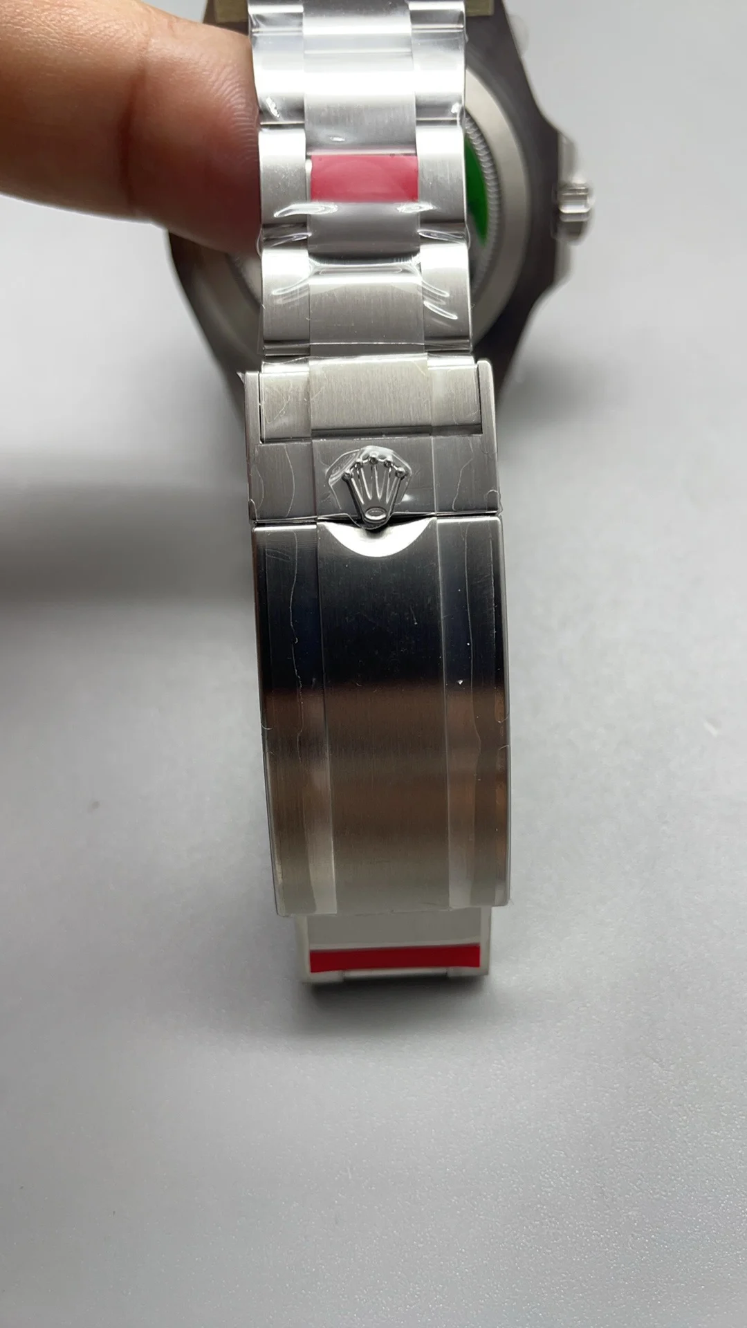Rolex Red Dial — photographed off the sweep