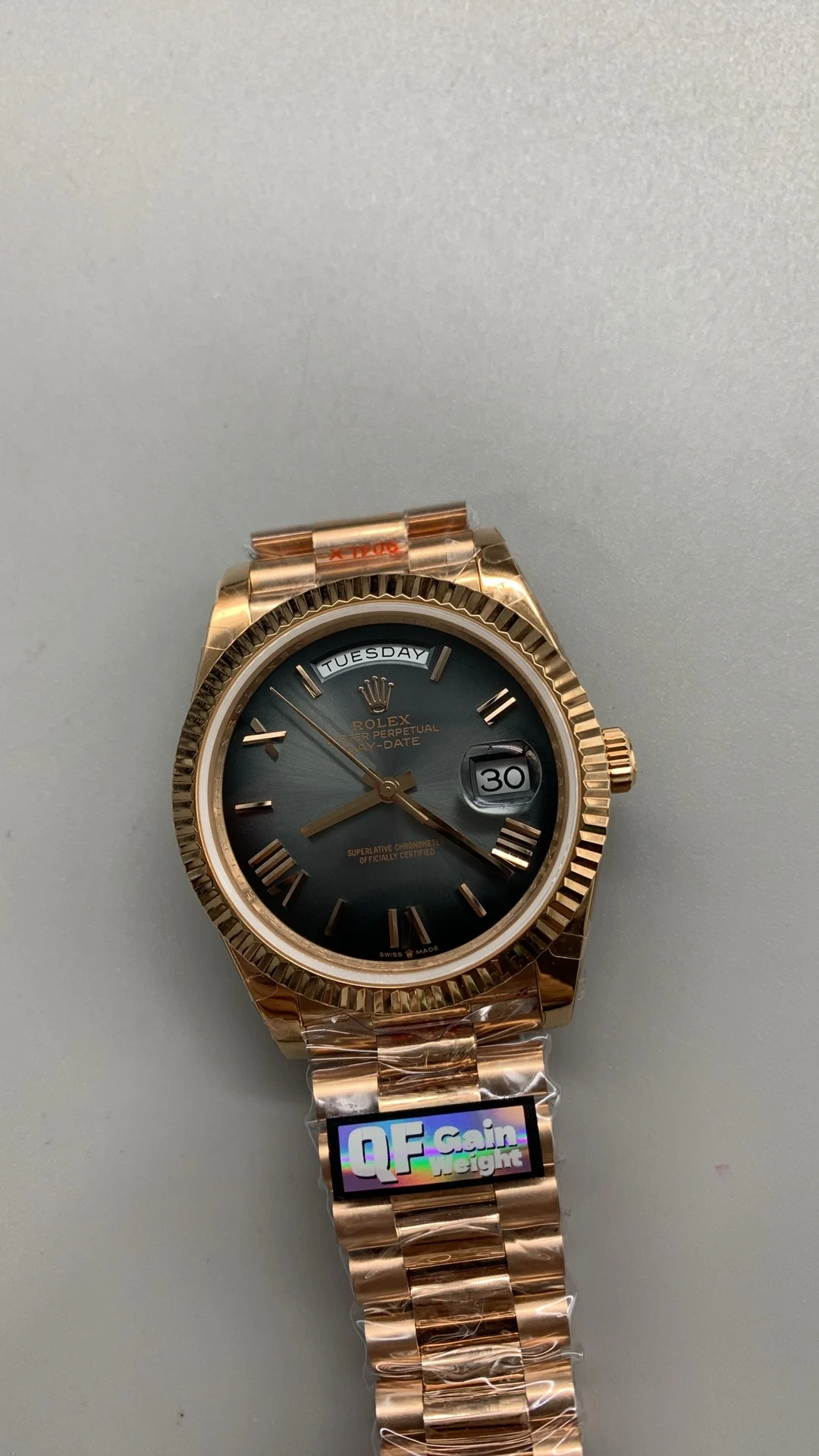 Rolex Rose Gold Black Dial 40mm — photographed off the sweep