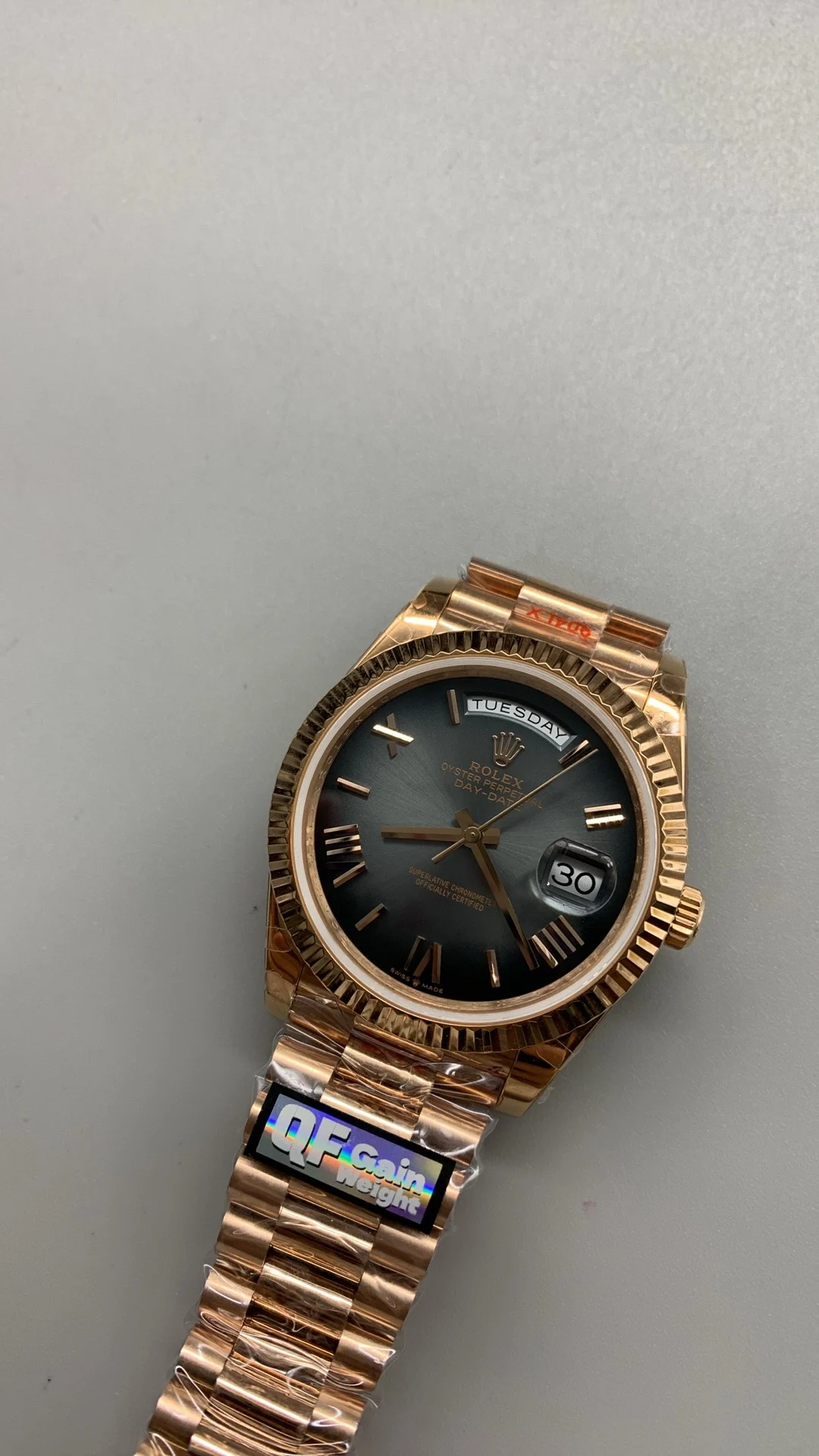 Rolex Rose Gold Black Dial 40mm — photographed off the sweep