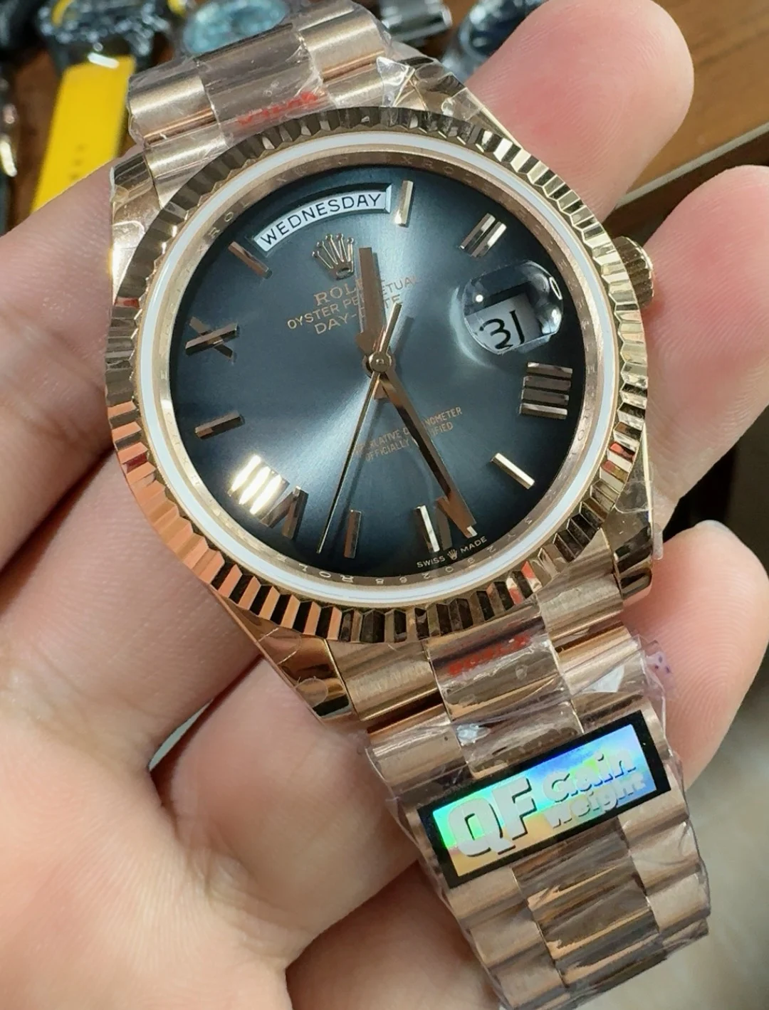 Rolex Rose Gold Black Dial 40mm — photographed off the sweep
