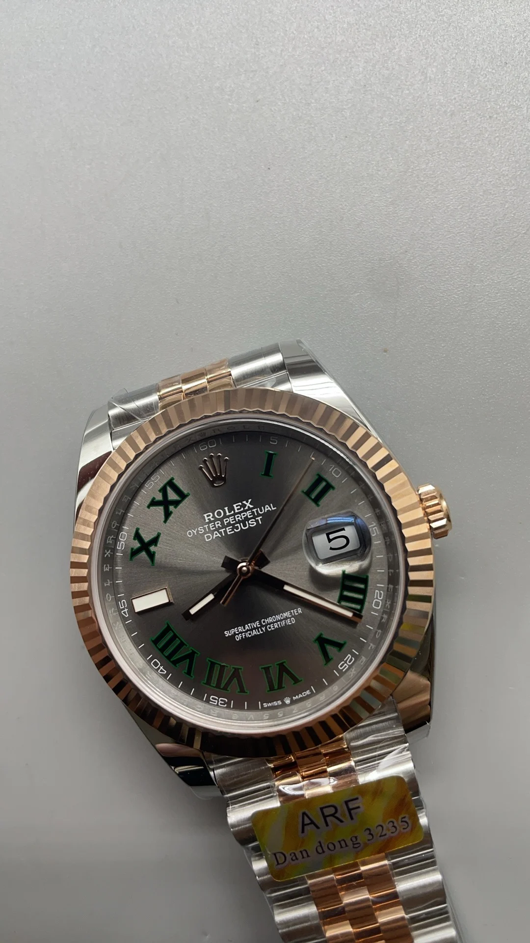 Rolex Rose Gold Green Dial — photographed off the sweep